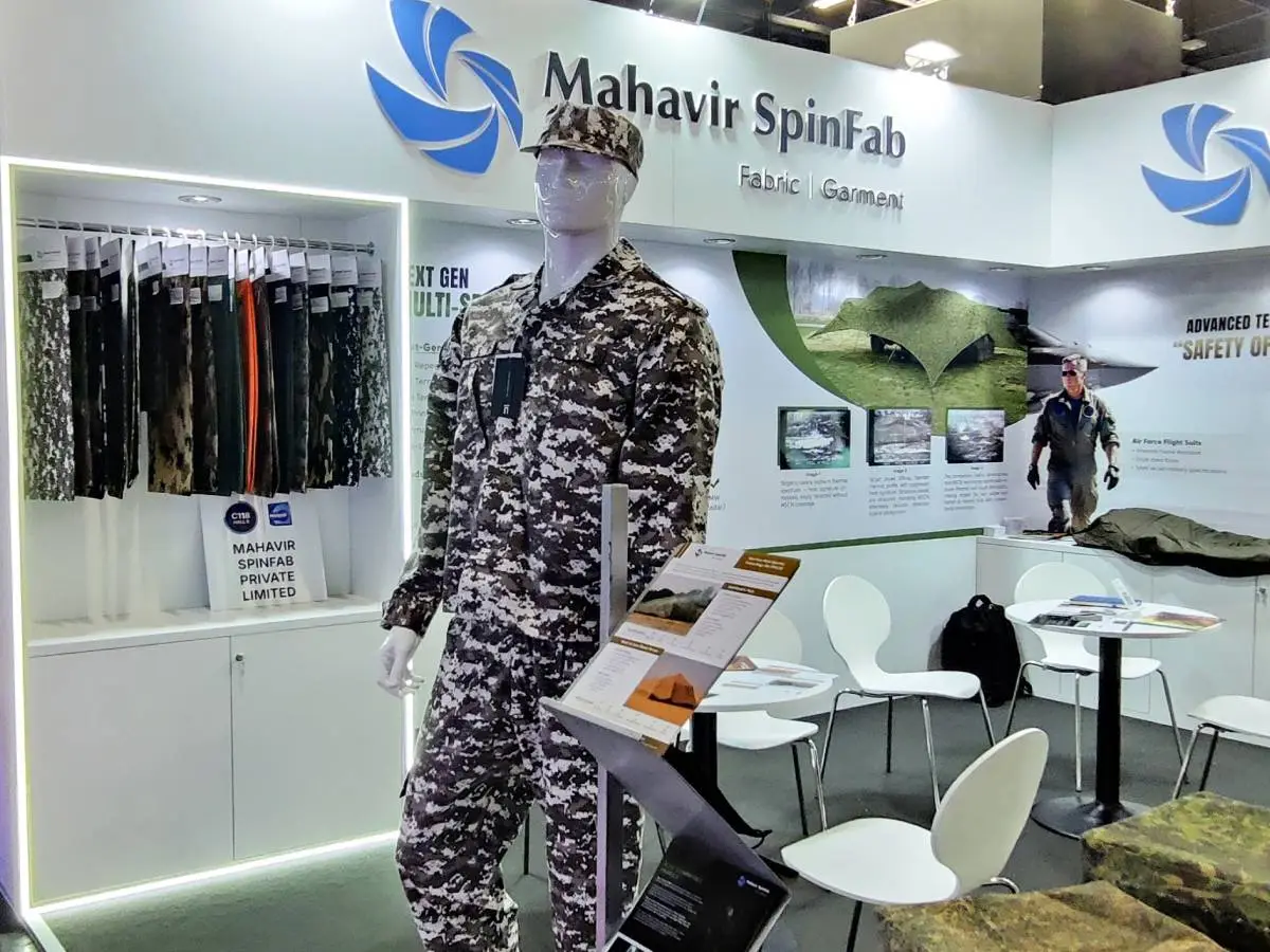IFR combat suit and digital camouflage uniform displayed by Mahavir Spinfab at Milipol Paris 2025.